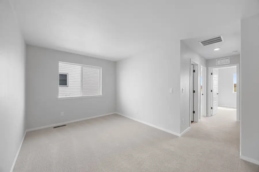 Spacious, unfurnished interior of a new home in Sky Ranch, Watkins (Image 24).