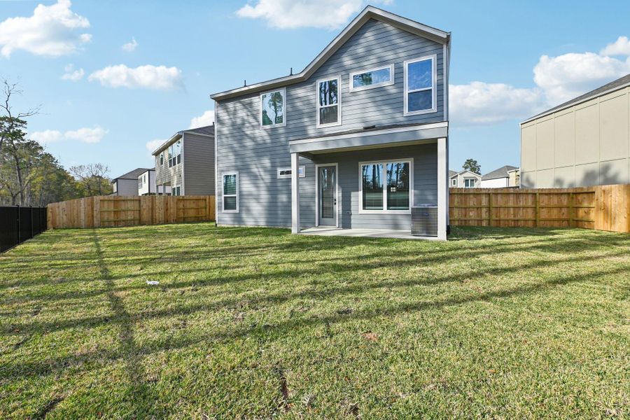 Exterior details and patio area of a home in Pinewood Trails - Luxe Series, Atascocita (Image 2). Exterior details and patio area of a home in Pinewood Trails - Luxe Series, Atascocita (Image 2).