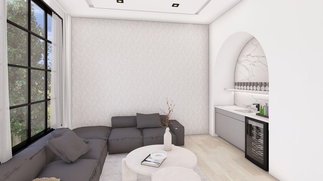 The formal parlor is opposite the dining room and has a built-in cocktail bar with sink, beverage cooler and storage.