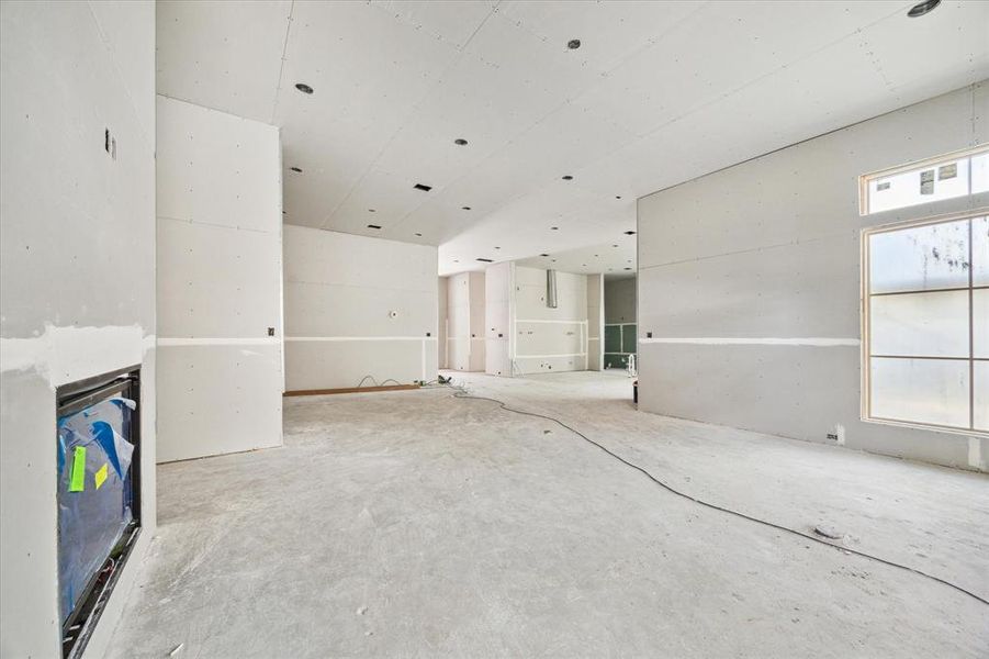 View from living room back toward kitchen and dining area.  Construction as of 10/29