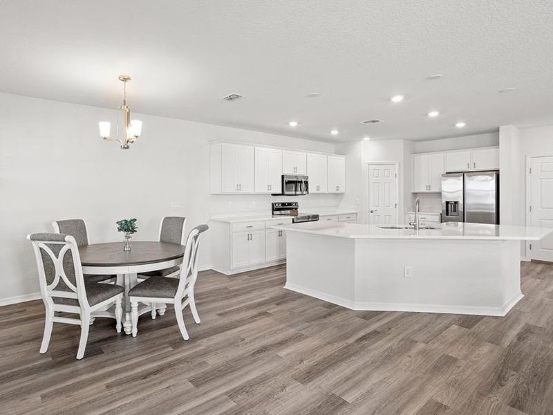 Either way, you`ll enjoy ample counter and dining space - Wesley II by Highland Homes Either way, you`ll enjoy ample counter and dining space - Wesley II by Highland Homes