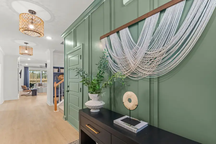 Representative furnished interior of a home built from the The Driftwood by Chesapeake Homes in Coastal Club of the Carolinas, Calabash (Image 5).