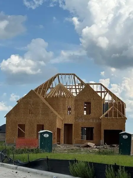 Front exterior of a new home in Valencia 60', Manvel, TX, highlighting curb appeal (Image 2). Front exterior of a new home in Valencia 60', Manvel, TX, highlighting curb appeal (Image 2).