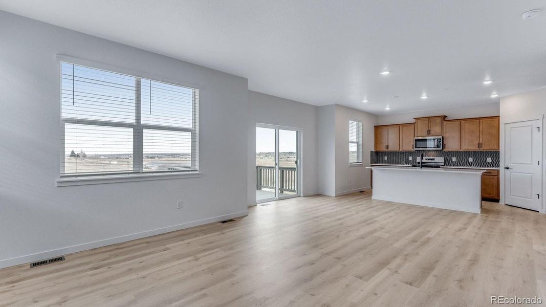 Spacious, unfurnished interior of a new home in Trails at Crowfoot, Parker (Image 35).