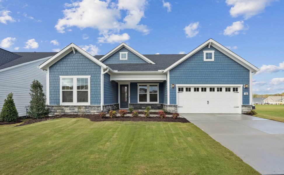 Representative exterior photo of a completed home built from the Aspen Creek by Tri Pointe Homes in The Meadows Collection at Serenity, Fuquay Varina, NC (Image 1).