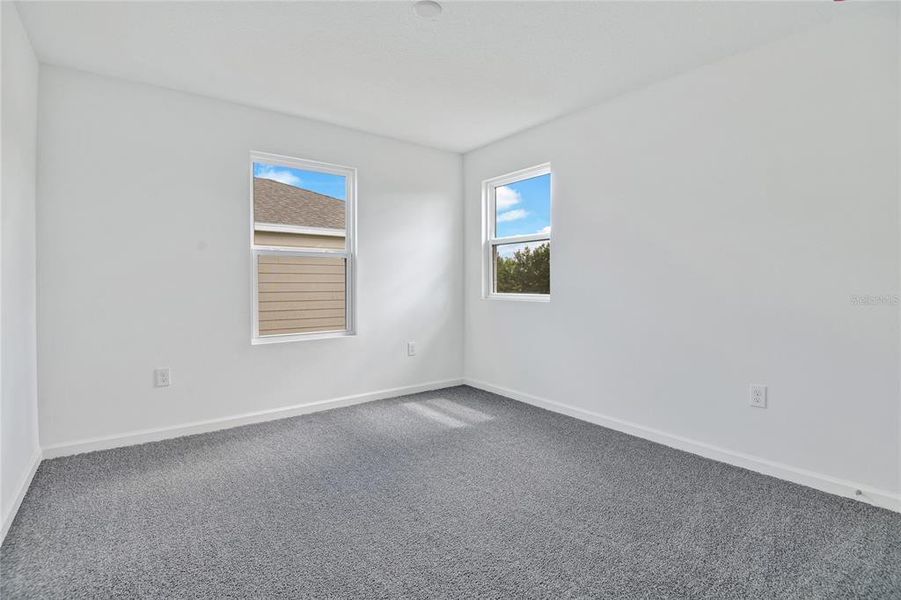 Spacious, unfurnished interior of a new home in Seasons at Shores of Lake Dell, Dundee (Image 18).