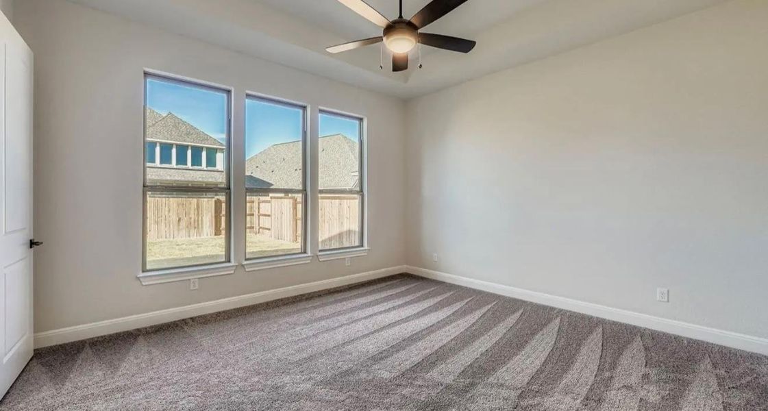 Spacious, unfurnished interior of a new home in 6 Creeks, Kyle (Image 7).
