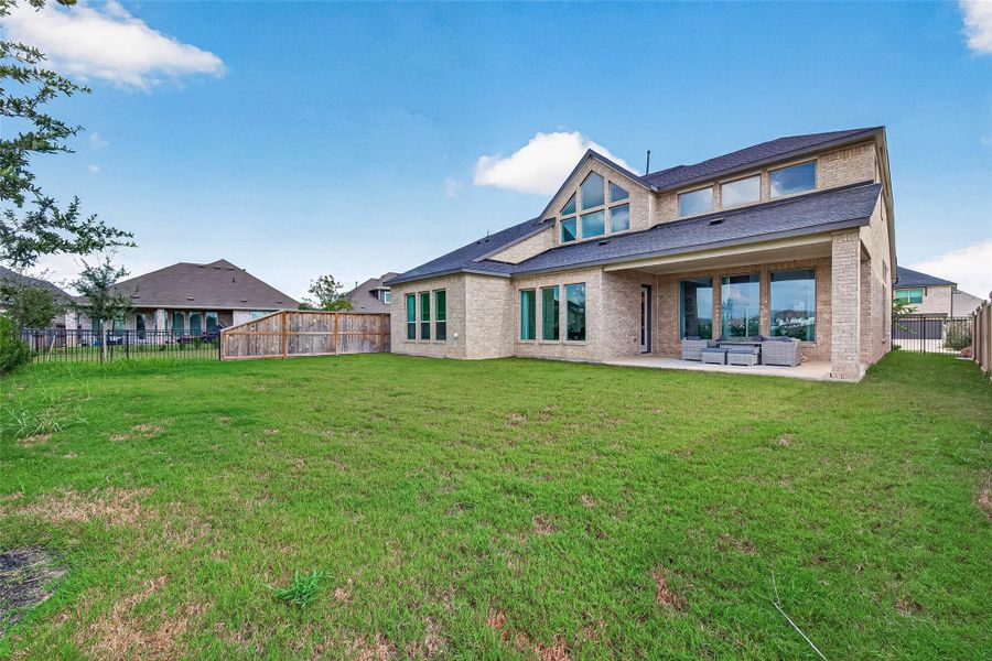 Exterior details and patio area of a home in , Brookshire (Image 3).