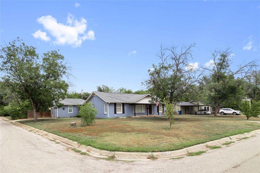 Front exterior of a new home in , Brownwood, TX, highlighting curb appeal (Image 12). Front exterior of a new home in , Brownwood, TX, highlighting curb appeal (Image 12).