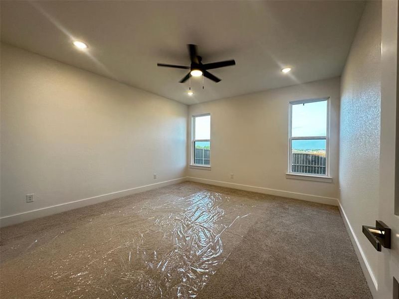 Spare room featuring baseboards, recessed lighting, and ceiling fan