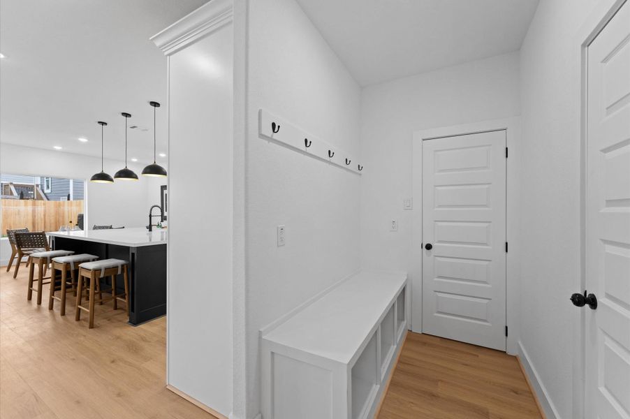 A mudroom is a great feature as it provides a hidden location for all the creature comforts, shoes, bags, etc. that you like to keep handy but out of sight.