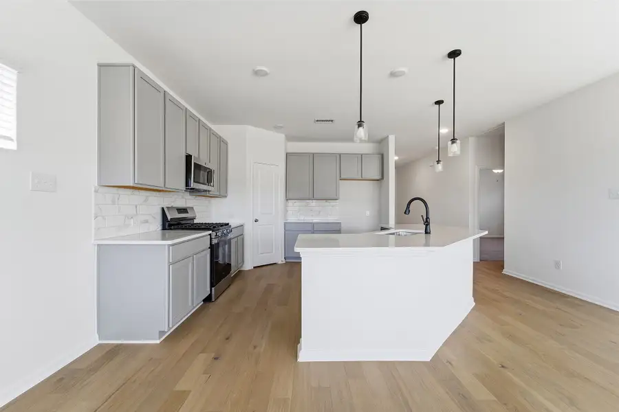 Furnished interior view inside a new home in Pebblebrook, Sherman (Image 6).