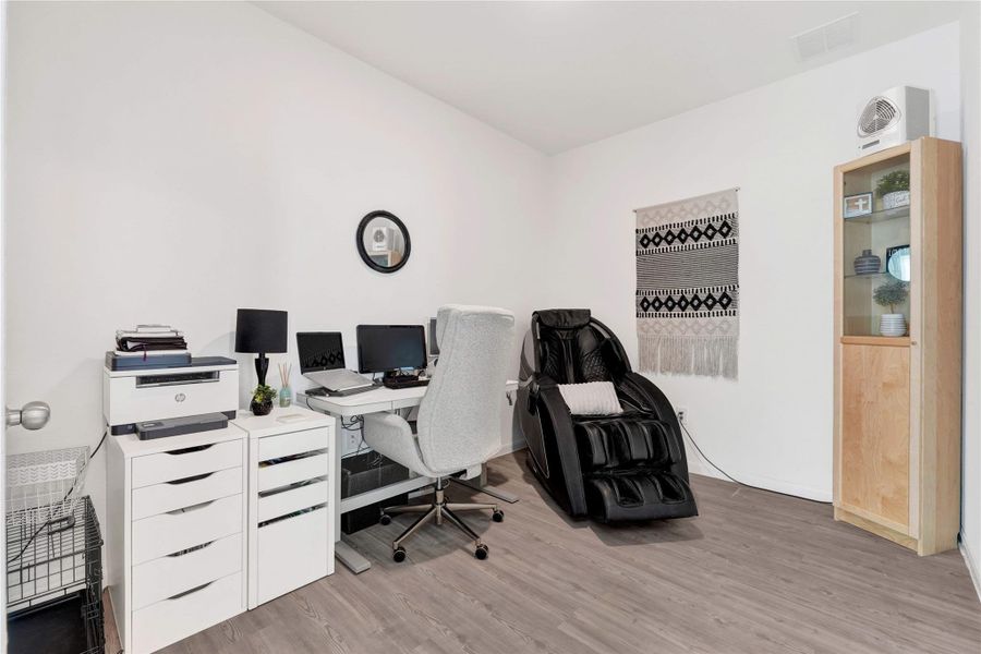 The secondary bedrooms are bright and versatile, ideal for guests, children, or a home office, complemented by a stylish full bathroom designed with modern finishes and thoughtful details.