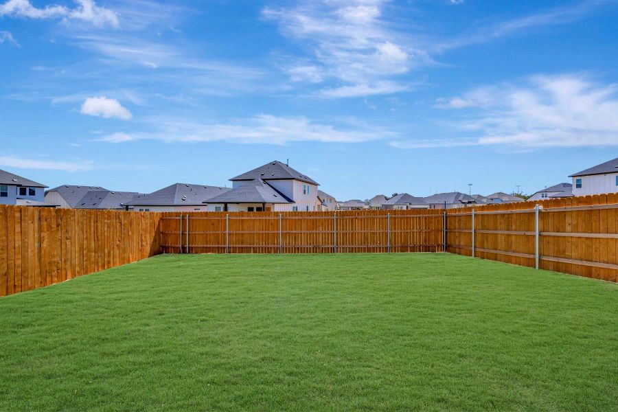 Exterior details and patio area of a home in Heritage, Dripping Springs (Image 19).