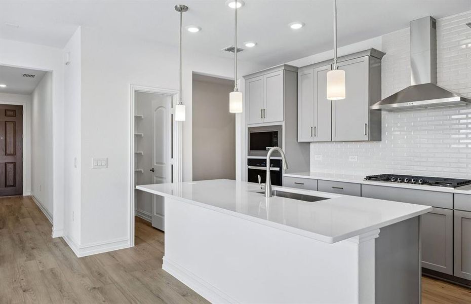 Kitchen with eat-in bartop island