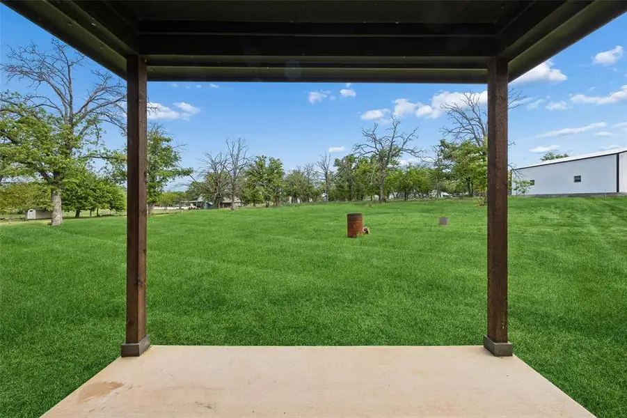 Exterior details and patio area of a home in , Springtown (Image 3).