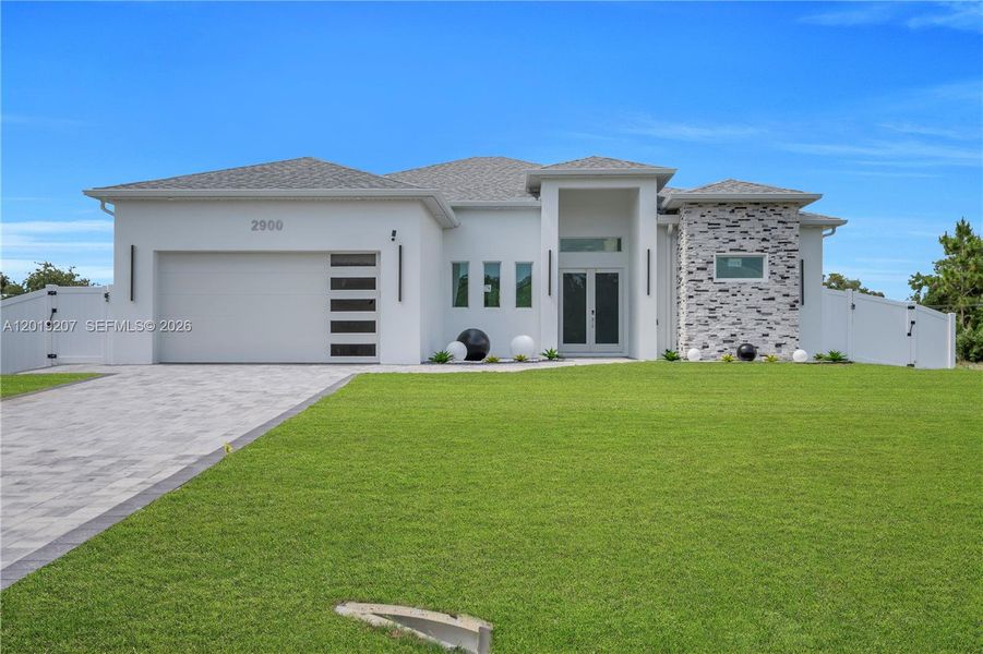 Exterior details and patio area of a home in , Lehigh Acres (Image 4). Exterior details and patio area of a home in , Lehigh Acres (Image 4).