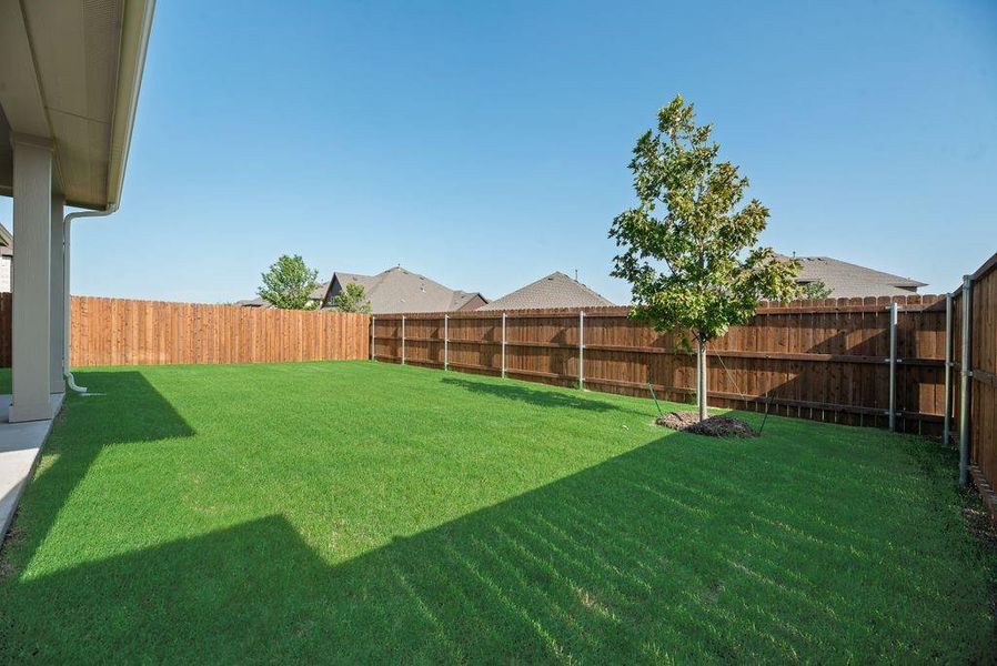 Exterior details and patio area of a home in Wildflower Ranch, Justin (Image 23). Exterior details and patio area of a home in Wildflower Ranch, Justin (Image 23).