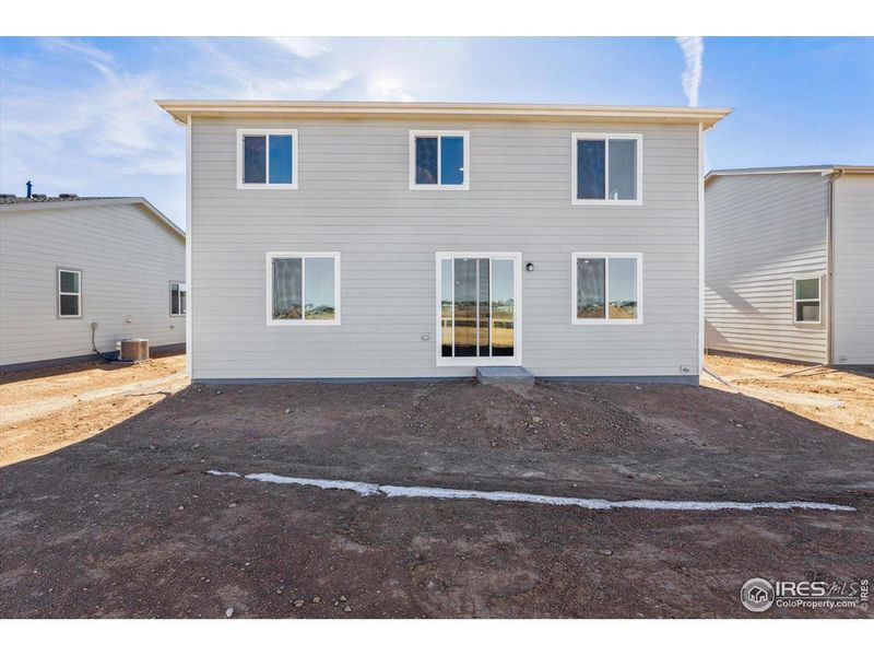 Exterior details and patio area of a home in Prairie Song, Windsor (Image 20).
