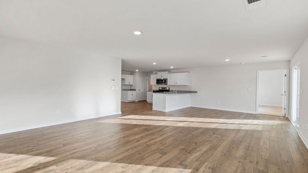 Spacious, unfurnished interior of a new home in Bentley Park, Greenwood (Image 22).