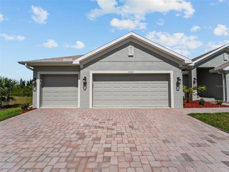 Front exterior of a new home in Port Charlotte, Port Charlotte, FL, highlighting curb appeal (Image 32).