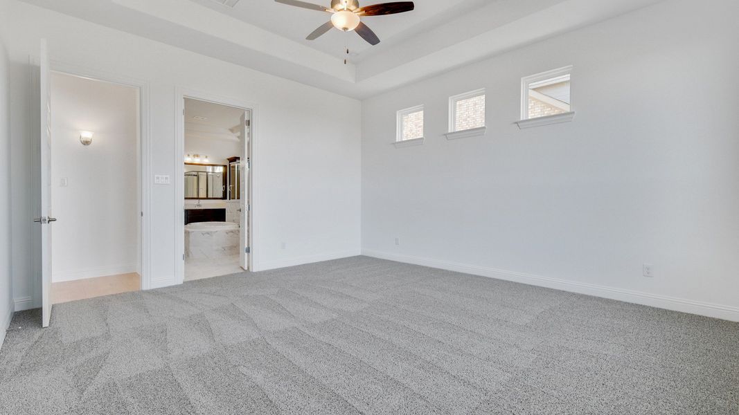 Representative furnished interior of a home built from the Stanford by DRB Homes in Creekhaven, Iowa Colony (Image 11).