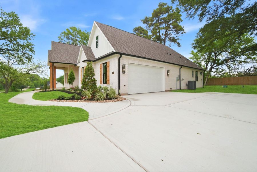 Front exterior of a new home in , Montgomery, TX, highlighting curb appeal (Image 27).
