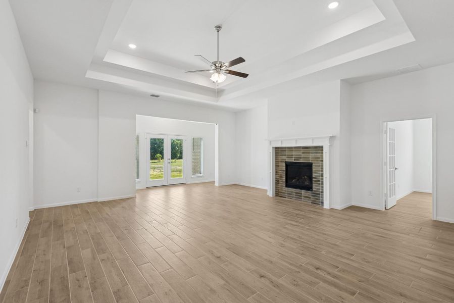 Impressive great room with cozy fireplace (*Photo not of actual home and used for illustration purposes only.)