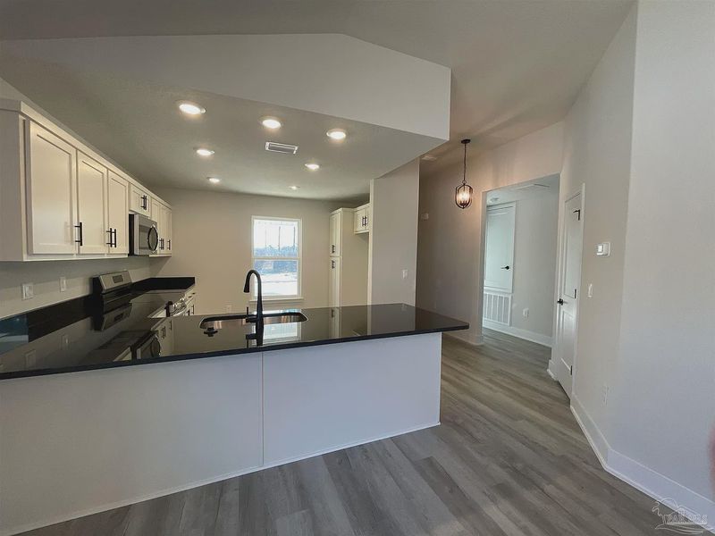Furnished interior view inside a new home in Turtle Creek, Cantonment (Image 4).