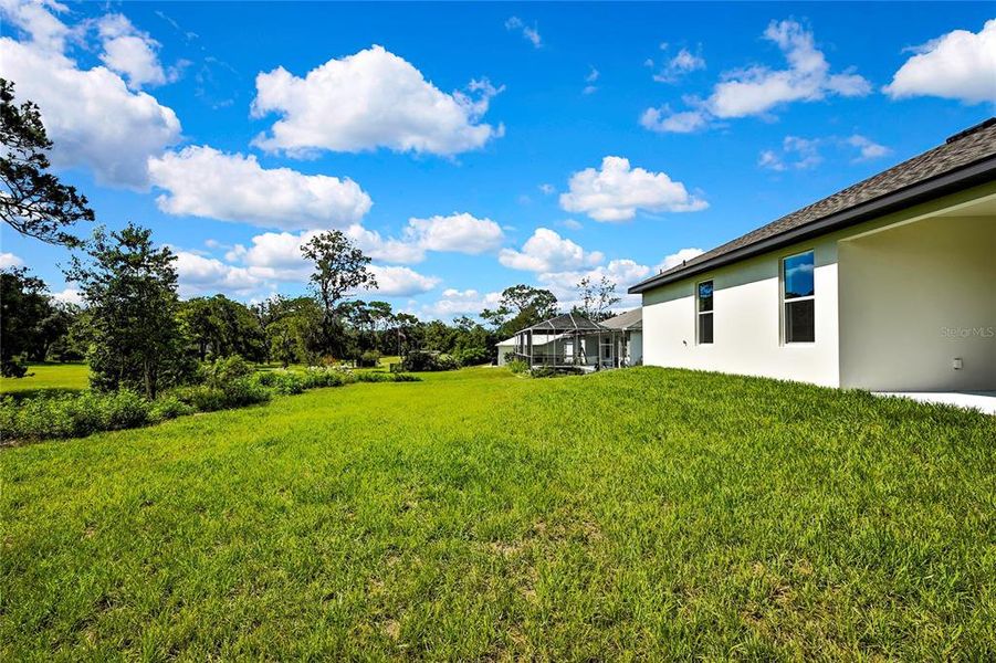 Front exterior of a new home in , Spring Hill, FL, highlighting curb appeal (Image 24).