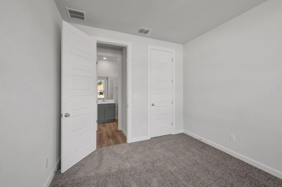 Spacious, unfurnished interior of a new home in The Meadows at Hunters Ranch, San Antonio (Image 22).