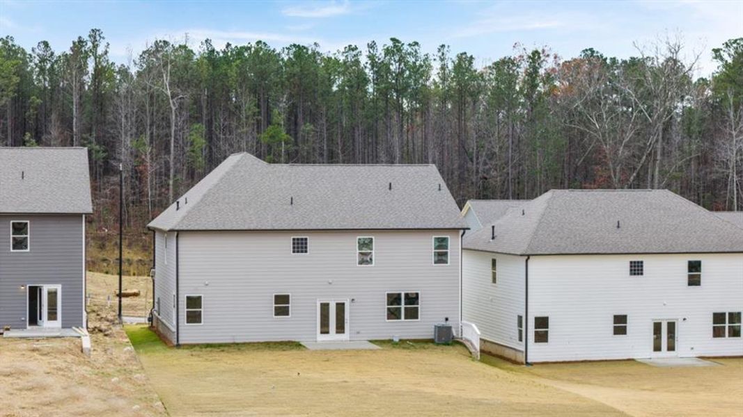 Exterior details and patio area of a home in Hamptons at Riverwood South, Dallas (Image 28).