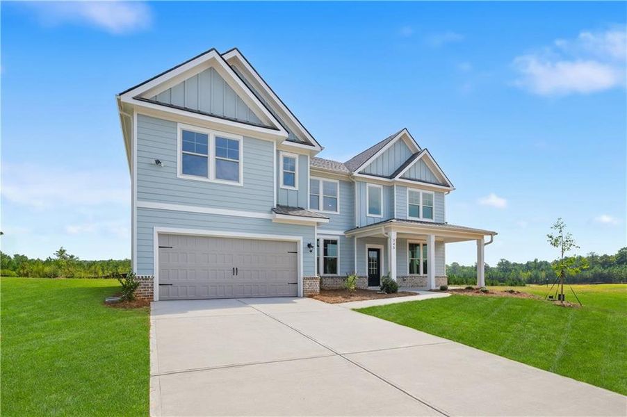 Front exterior of a new home in Brighton, Locust Grove, GA, highlighting curb appeal (Image 16). Front exterior of a new home in Brighton, Locust Grove, GA, highlighting curb appeal (Image 16).