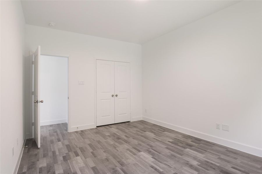 2nd master bedroom looking towards the closet and entrance door. 2nd master bedroom looking towards the closet and entrance door.