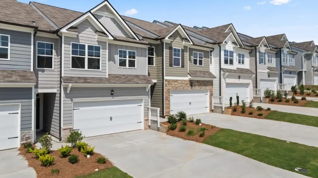 Front exterior of a new home in Rolling Meadows, Jasper, GA, highlighting curb appeal (Image 2). Front exterior of a new home in Rolling Meadows, Jasper, GA, highlighting curb appeal (Image 2).
