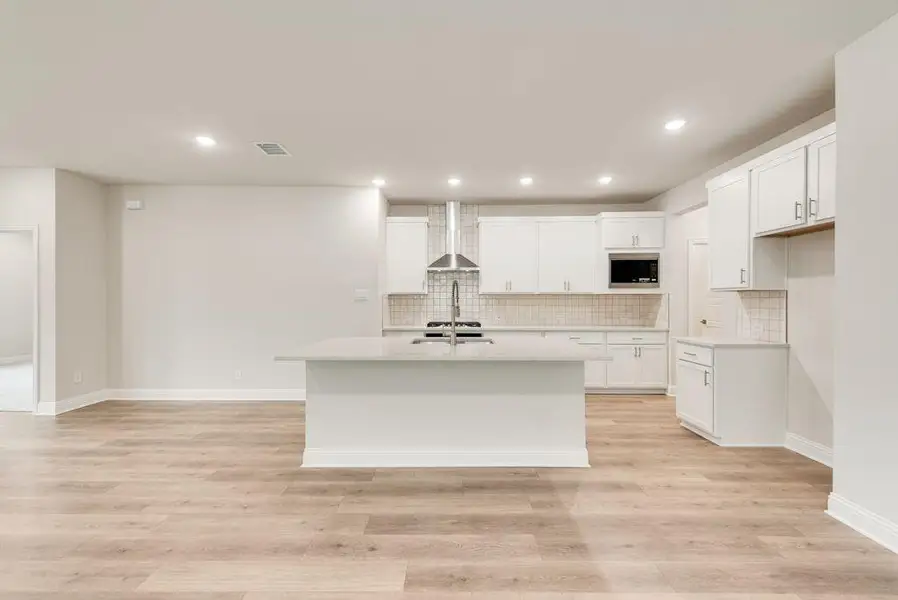 Furnished interior view inside a new home in Spiritas Ranch, Little Elm (Image 7).