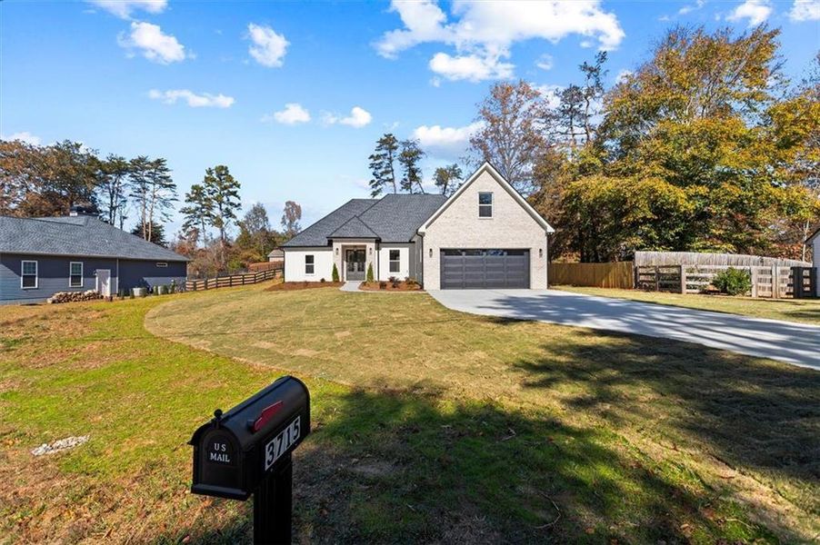 Front exterior of a new home in , Gainesville, GA, highlighting curb appeal (Image 31).
