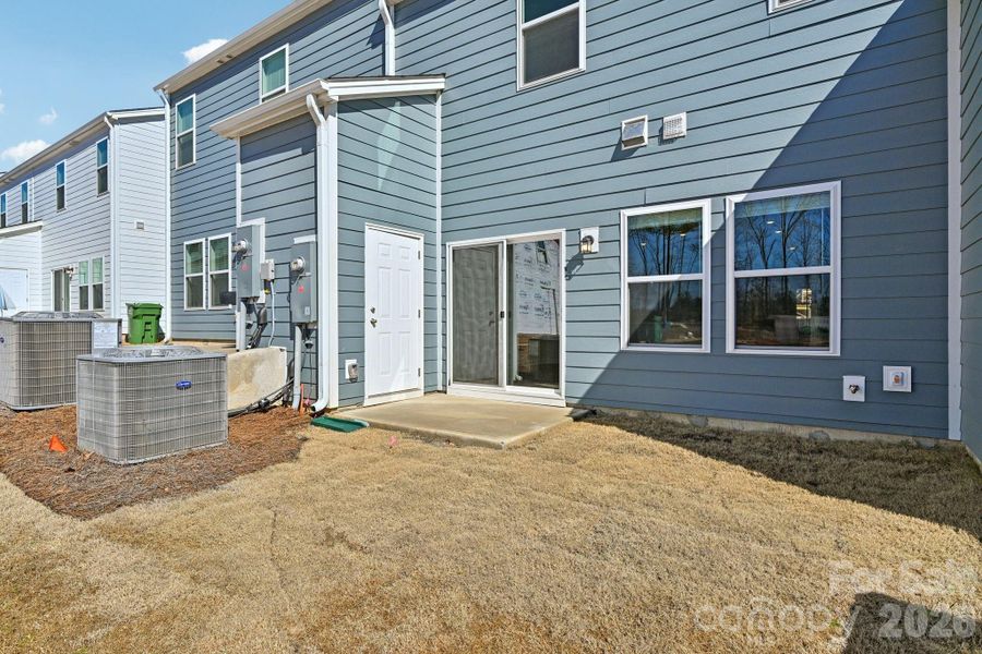Exterior details and patio area of a home in Meadows at Wilson Farms - The Summit Series, Fort Mill (Image 2). Exterior details and patio area of a home in Meadows at Wilson Farms - The Summit Series, Fort Mill (Image 2).