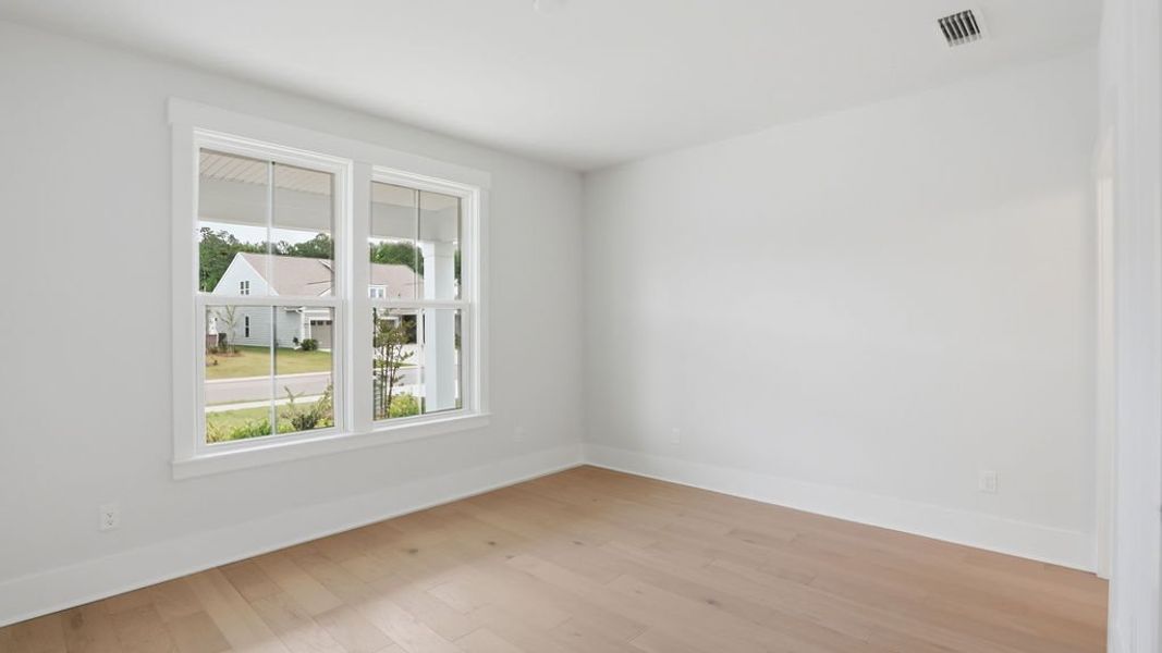 Spacious, unfurnished interior of a new home in Sun City Hilton Head, Bluffton (Image 19).