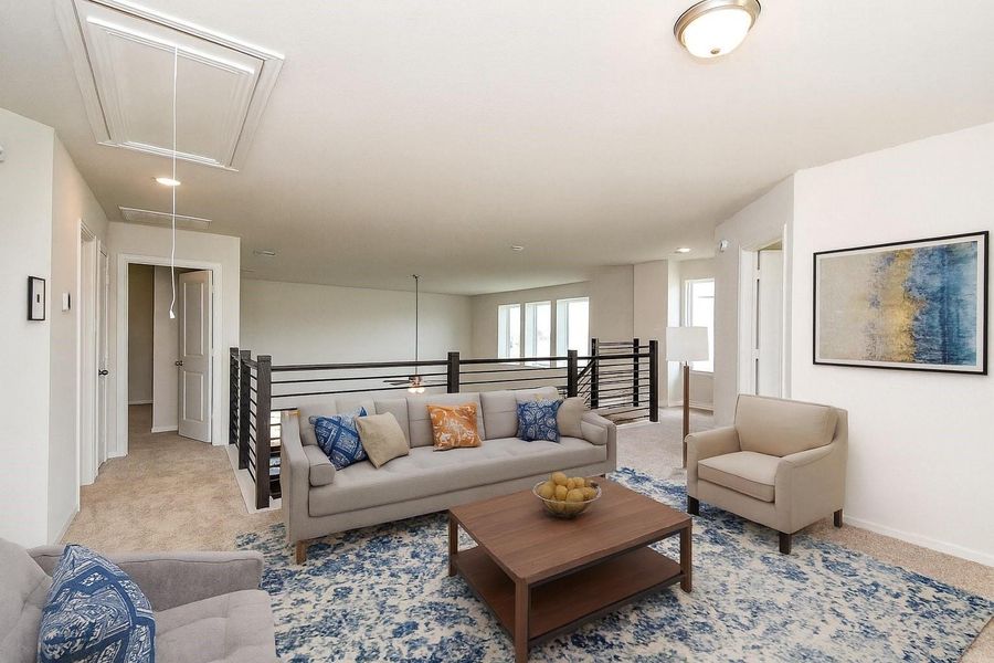 Expansive game room located upstairs. (Virtually staged by A.I.) Expansive game room located upstairs. (Virtually staged by A.I.)