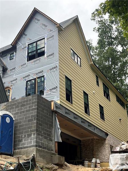 Front exterior of a new home in , Atlanta, GA, highlighting curb appeal (Image 9).