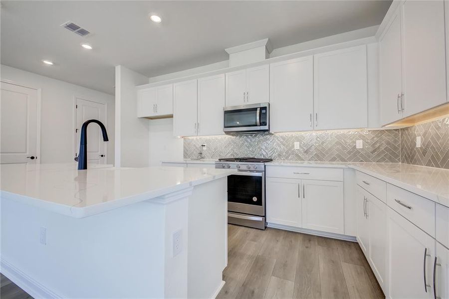 Furnished interior view inside a new home in Bungalow Walk at Lakewood Ranch, Sarasota (Image 5).