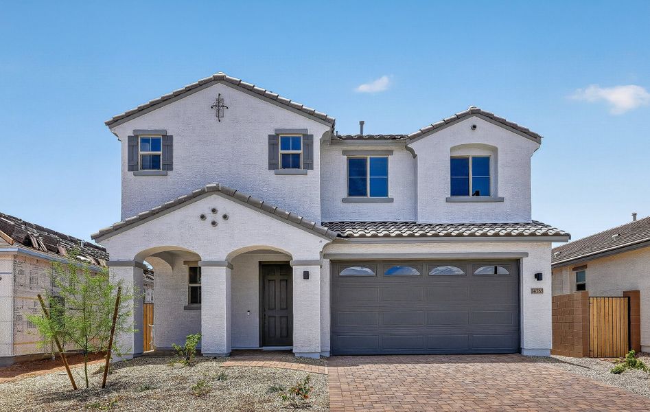 Front exterior of a new home in Rancho Mercado, Surprise, AZ, highlighting curb appeal (Image 1). Front exterior of a new home in Rancho Mercado, Surprise, AZ, highlighting curb appeal (Image 1).