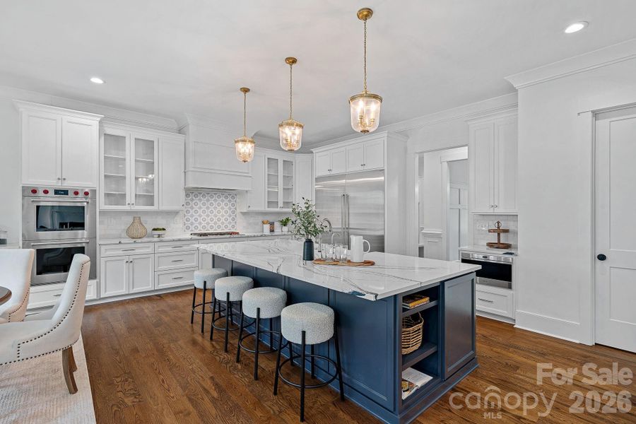 Chef's kitchen equipped with luxury appliances