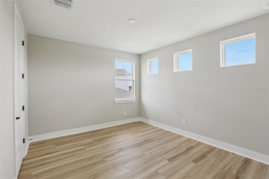 Spacious, unfurnished interior of a new home in Lagoon Residences at Epperson, Wesley Chapel (Image 51).