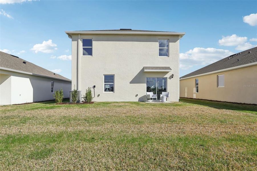 Exterior details and patio area of a home in Hawthorne Ranch Townhome, Lakeland (Image 25). Exterior details and patio area of a home in Hawthorne Ranch Townhome, Lakeland (Image 25).