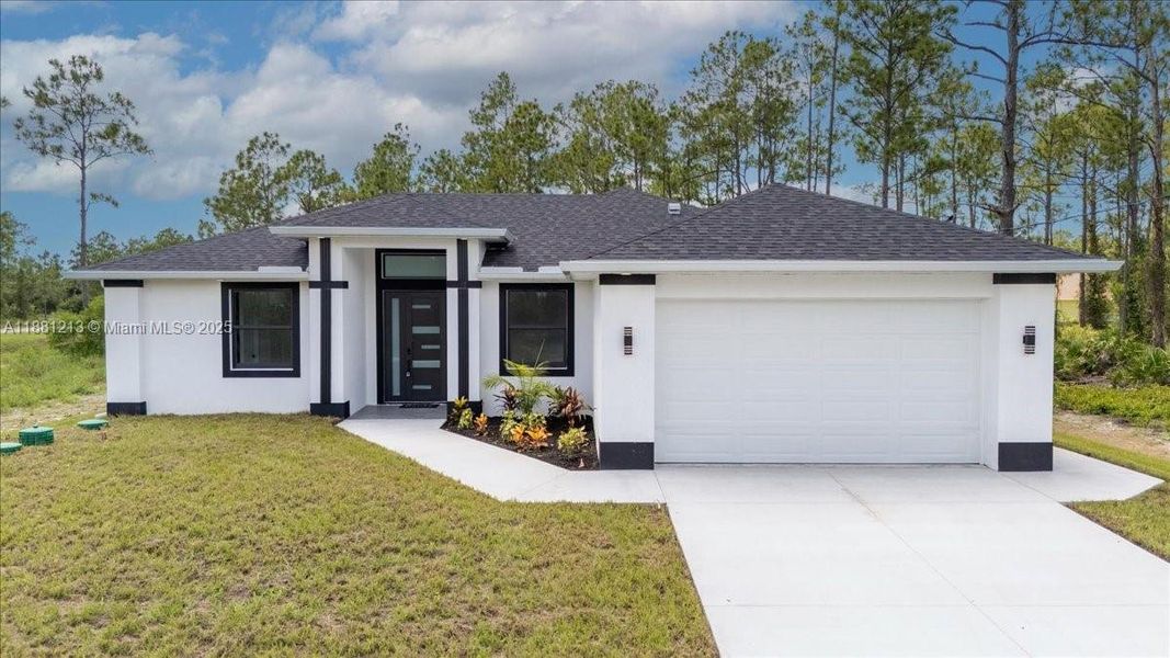 Front exterior of a new home in , Lehigh Acres, FL, highlighting curb appeal (Image 25). Front exterior of a new home in , Lehigh Acres, FL, highlighting curb appeal (Image 25).