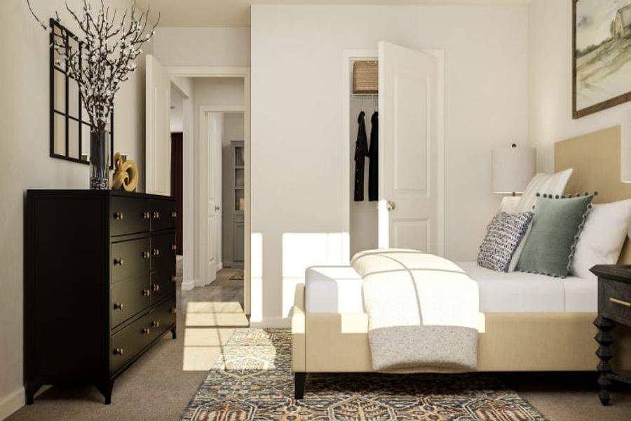 A room with a bed and a dresser.