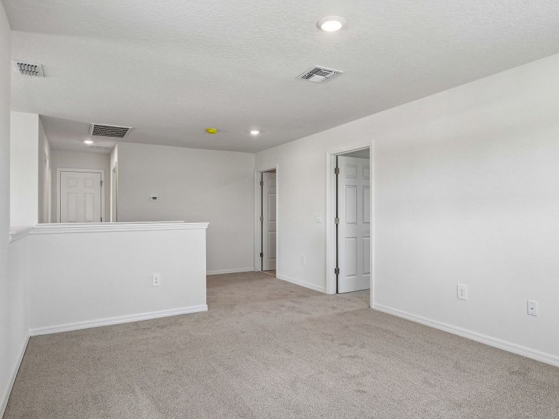 Spacious, unfurnished interior of a new home in Crosswinds - Signature Series, Haines City (Image 10).