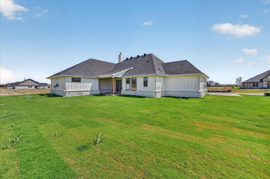Front exterior of a new home in Paloma Ranches, Justin, TX, highlighting curb appeal (Image 20). Front exterior of a new home in Paloma Ranches, Justin, TX, highlighting curb appeal (Image 20).